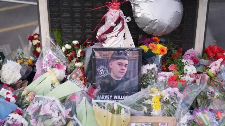 Floral tributes to Harvey Willgoose left at Sheffield United's Bramall Lane football stadium