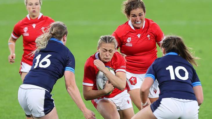 Wales' Hannah Jones takes a crash-ball against Scotland during the Pool A 2021 Rugby World Cup match at Northland Events Centre on 9 October 2022, in Whangarei, New Zealand.