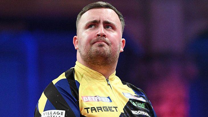 Luke Littler reacts during his semi-final against Gian van Veen on day eight of the 2026 Betfred World Matchplay