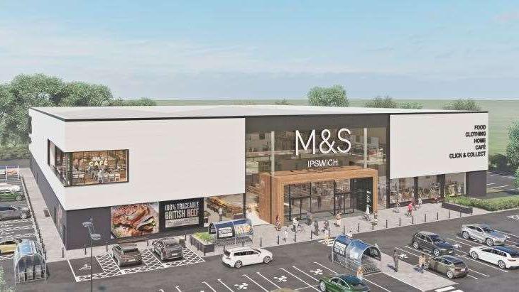 An artist's impression of what the new M&S store at the Copdock Interchange could look like. It shows a large square white building with the M&S logo on the front on a large window. A car park sits in front of the store.
