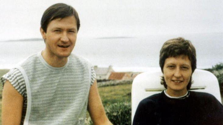 Pat and Geraldine Finucane pictured on holiday with the sea in the background