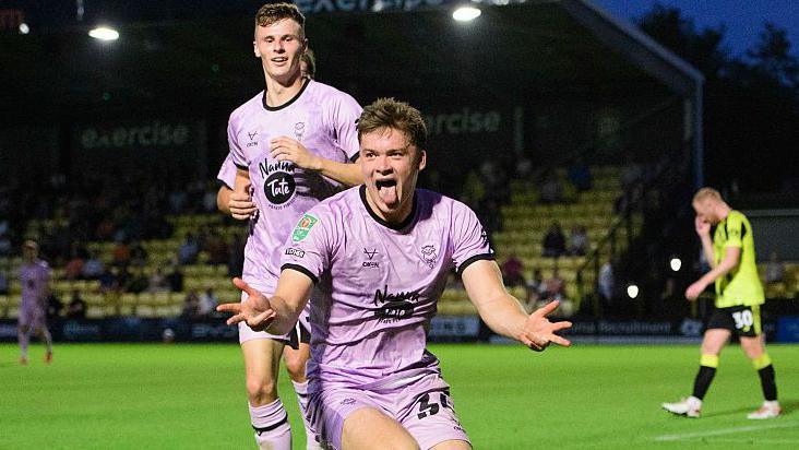 Freddie Draper celebrating scoring.
