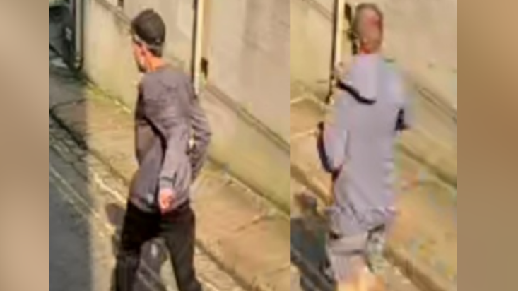 CCTV images show two men walking on a street. The men are facing away from the camera. The man on the left is wearing a long sleeve grey top. The man on the right is wearing a grey hoodie and shorts.