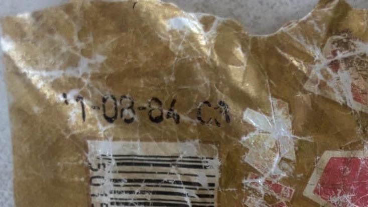 A close up of the expiry date. The first two of the six numbers are unclear, but then it looks like it says "-08-84".