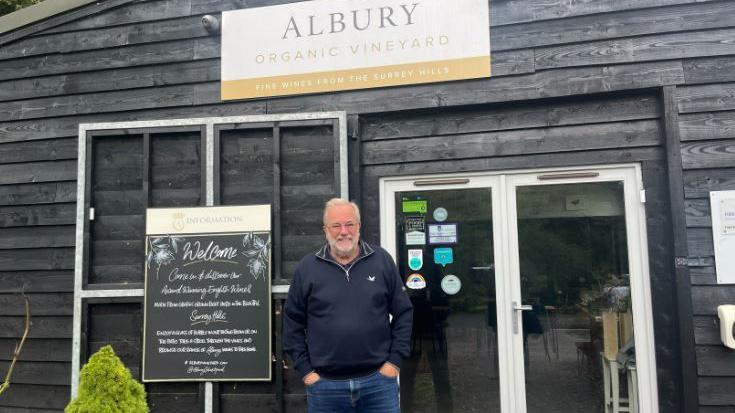 Nick Wenham, owner of Albury Organic Vineyard, outside the building to his vineyard