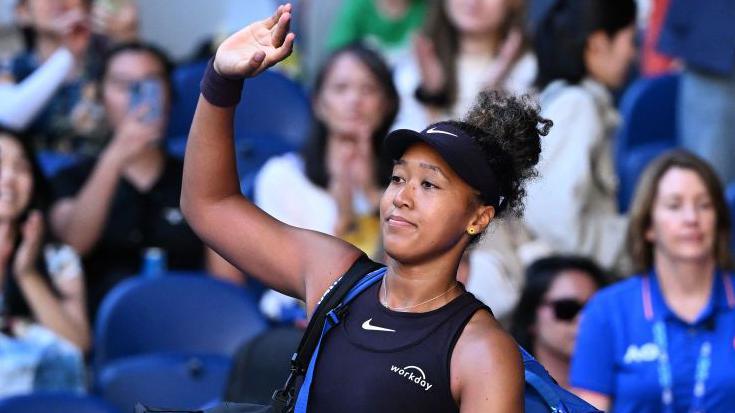 Naomi Osaka waves goodbye after retiring injured against Belinda Bencic