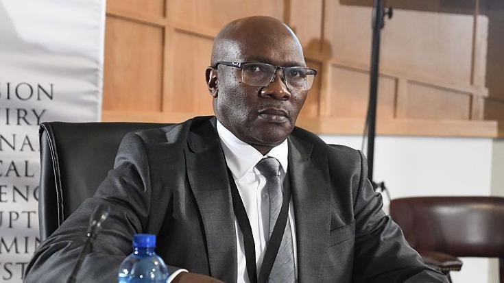 Lt-Gen Dumisani Khumalo is seen testifying at a public inquiry into police corruption