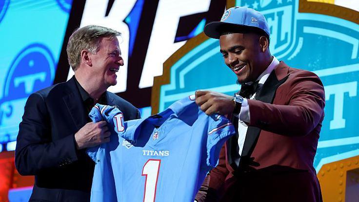 NFL commissioner Roger Goodell poses with Keldric Faulk after the latter was selected in the 2026 NFL Draft