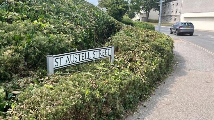 A signpost on the corner of St Austell Street in Truro