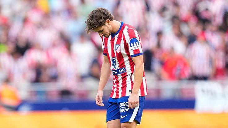 Julian Alvarez heads off the pitch after Atletico Madrid's draw with Villarreal