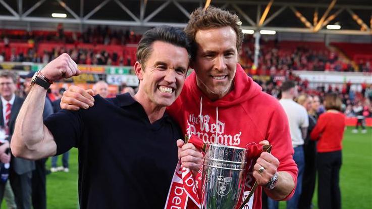 Ryan Reynolds and Rob Mac looking at camera