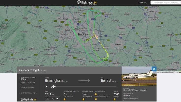 A map image showing an aircraft. Its route is in green and yellow, going around in large loops over an area marked Birmingham