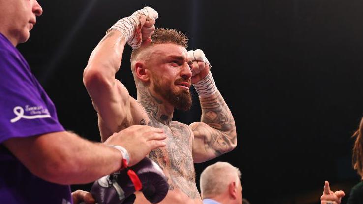 Lewis Crocker celebrates his victory