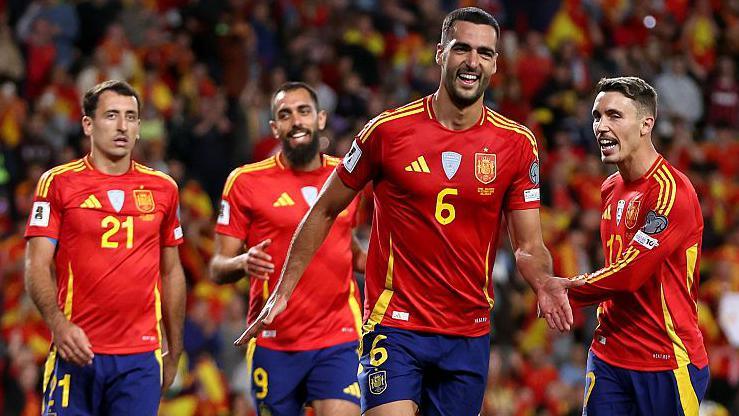 Mikel Merino celebrates scoring for Spain