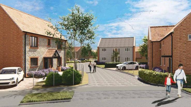 An artists impression of Broadland Housing's housing scheme, showing a number of houses, people walking, cars parked, trees, foliage and driveways 