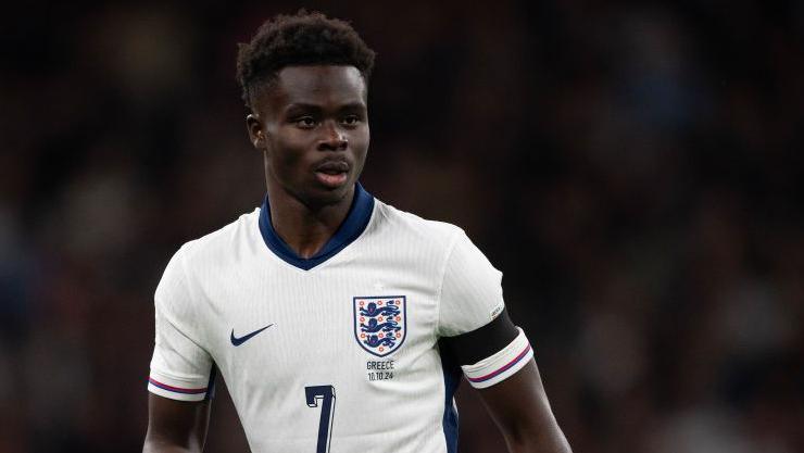 Bukayo Saka playing for England