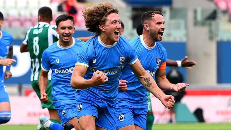Greg Walters celebrates his goal