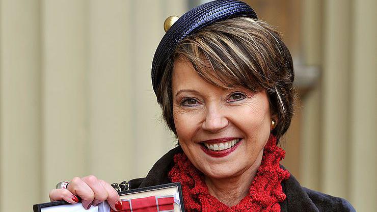 Lady Catherine Meyer holds her Commander of the British Empire(CBE) during a ceremony at Buckingham Palace in 2013.