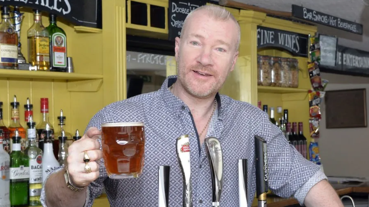 Matthew Bryant behind the bar of the Hare and Hounds in Maidstone