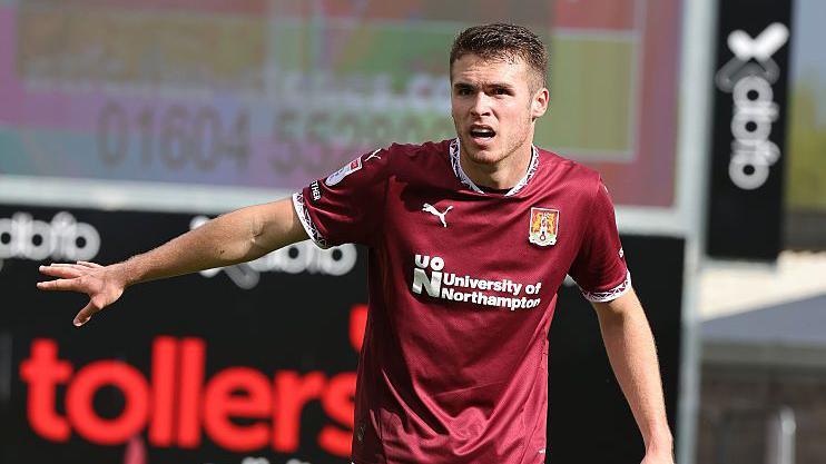 Northampton Town defender Max Dyche in action.