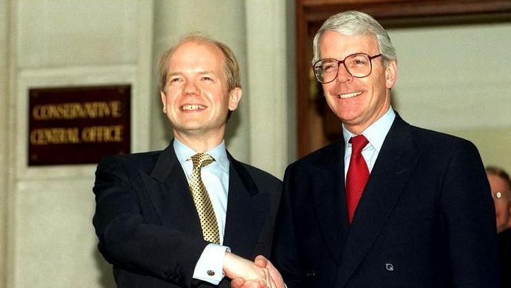 William Hague (left) being congratulated by former Conservative Prime Minister and party leader John Major outside Conservative Central Office after he was voted the new leader of the Conservative Party.