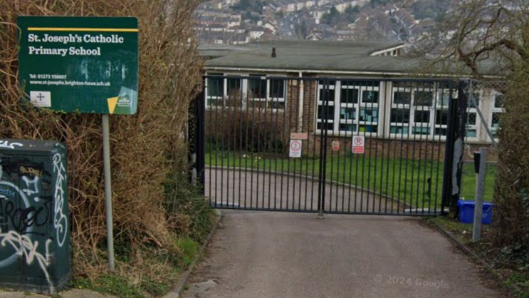 A Google Street image of school gates and a sign that says "St Joseph's Catholic Primary School".