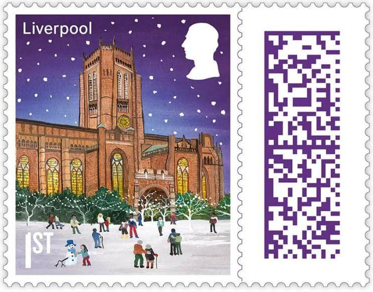 An illustrated version of Liverpool Cathedral on a 1st class stamp. the building is lit up and lights are hung across bushes outside it. A child is building a snowman and people are gathering to watch the lights. An elderly couple are watching on. 