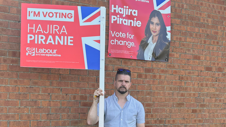 Tim Durham with a Labour sign