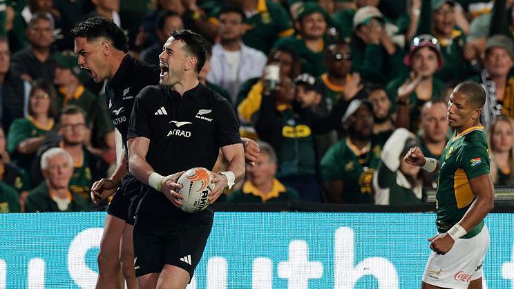 Will Jordan celebrates his second try