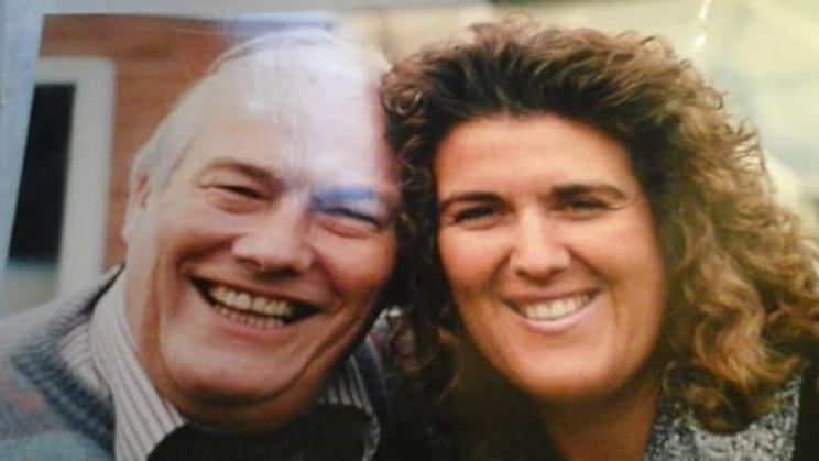 Claire McDowell with her dad Fred. The pair have their heads together and are smiling in an old family photo.