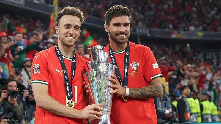 Diogo Jota and Ruben Neves celebrating Portugal's Nations League triumph in June