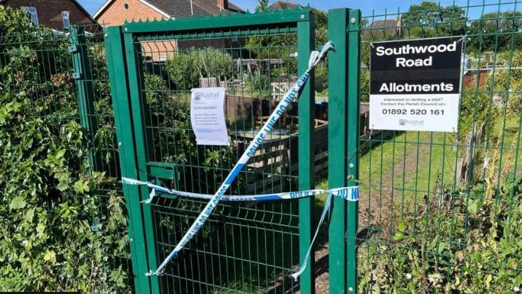 Police tape on the gate at the allotments