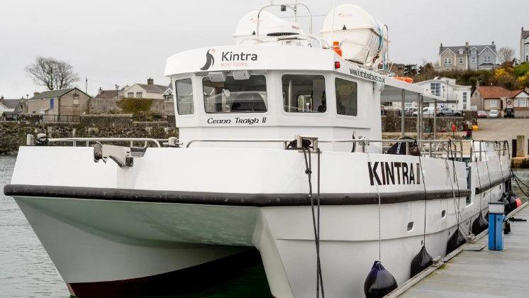 The Kintra passenger ferry docked at the harbour