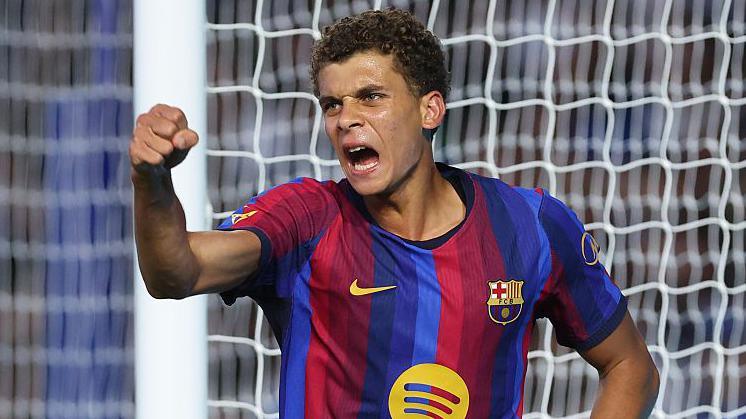 Hamza Abdelkarim celebrates scoring for Barcelona