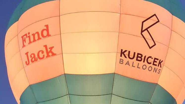 The words 'Find Jack' in red text are seen on the mid section of a hot air balloon.