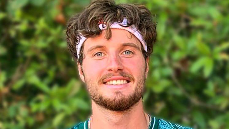 Toby Samuel smiling at the camera