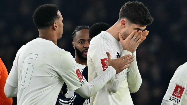 Arsenal's Kai Havertz is consoled by team-mate Gabriel after missing the vital penalty in the FA Cup Third Round shoot-out loss against Manchester United