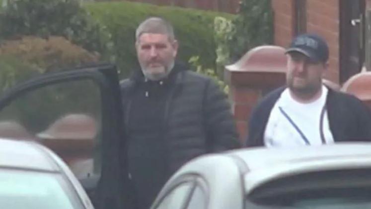 L-R: Stephen Earle and Terence Earle in St Helens getting into a car