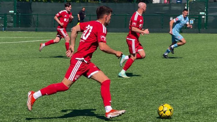 Action from Jersey Bulls v Hastings United