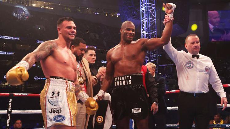 Daniel Dubois has his hand raised after beating Kevin Lerana