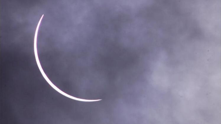 The sun as it is eclipsed by the moon as seen from Torquay on 11 August 1999. After 72-years the solar eclipse was slightly obscured by the British summer weather.
