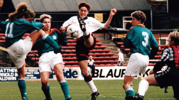 Kerry Davis playing for England