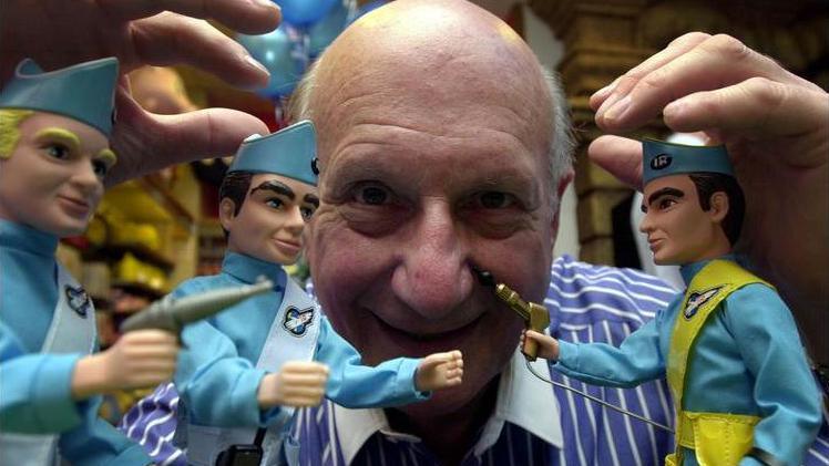 Gerry Anderson is pictured here with his famous Thunderbirds puppets.