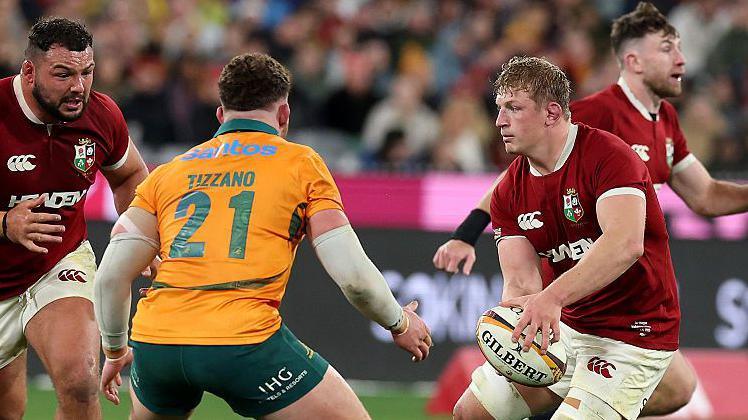 Jac Morgan about to make a pass for the British and Irish Lions during their second Test with Australia