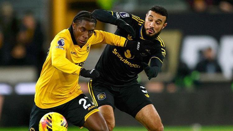 Manchester United defender Noussair Mazraoui (right)