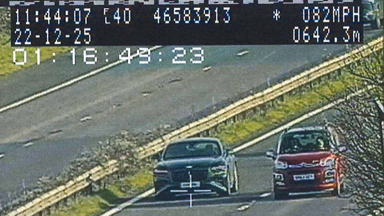 Hammond is shown in a police image driving on a main road overtaking a car in the fast lane. Police data on screen shows he is travelling at 82mph.