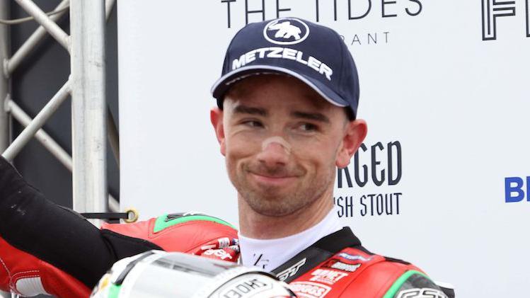 Glenn Irwin on the podium at the North West 200