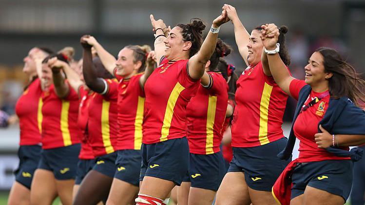 Spain thank their fans after the match