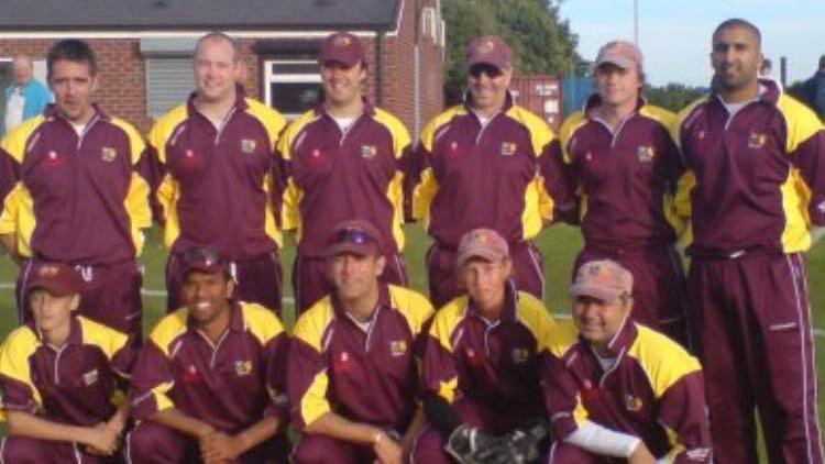 A cricket team photo including Joe Root and Izzy Asif