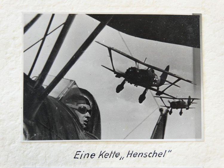 Photo taken from a Henschel aircraft towards the back of the plane shows two others following in a straight line in tight formation